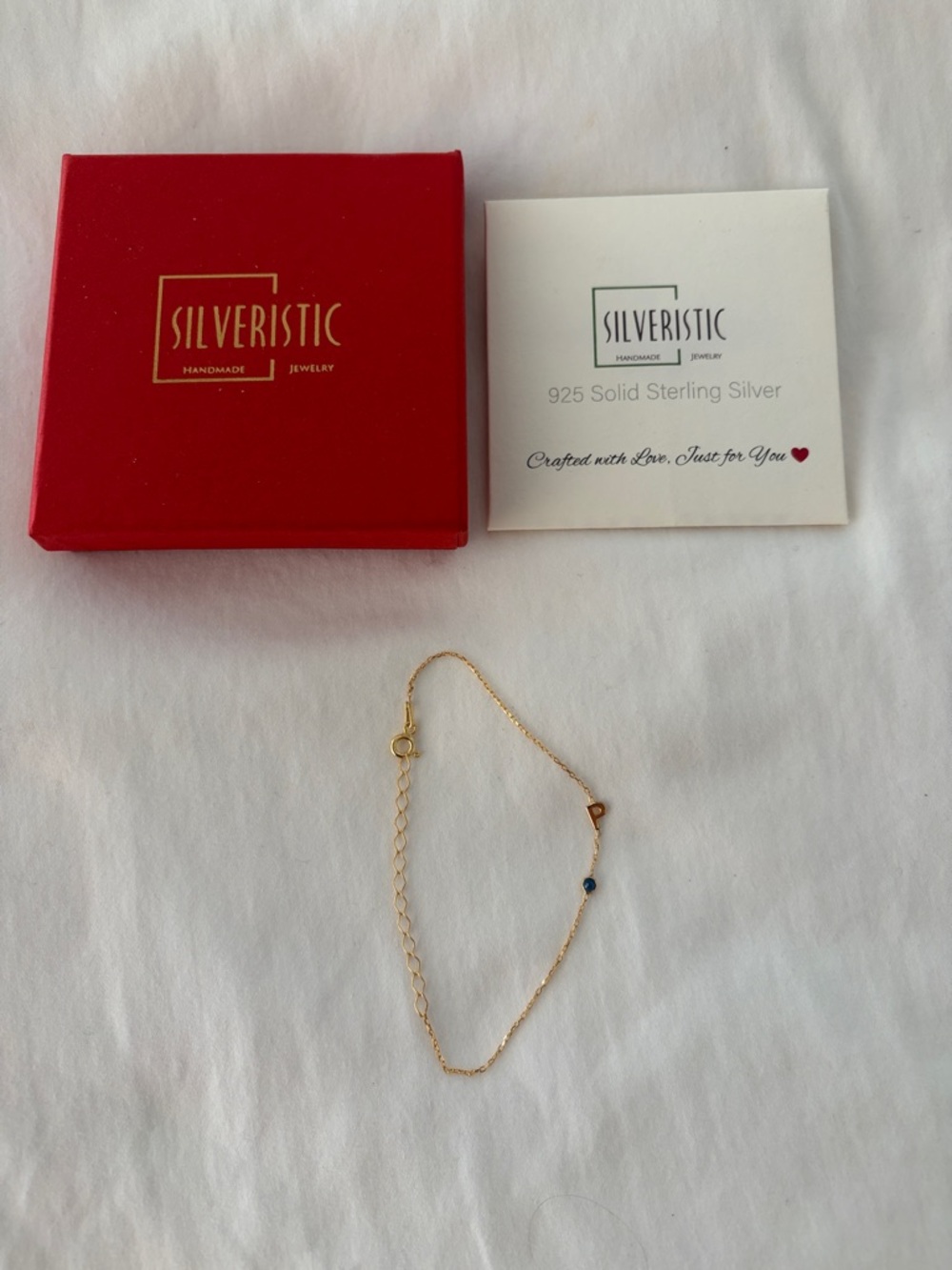 Silveristic Handmade Sterling Silver Gold-Tone Bracelet with P and blue stone
